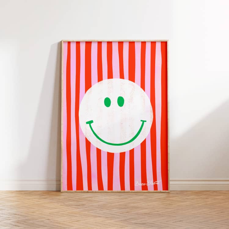 Pink Smiley in Stripes shown as a styled art print mockup